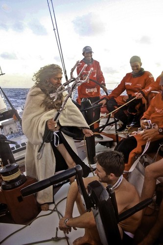King Neptune hearing the crimes committed by Adam Minoprio upon crossing the equator CAMPER with Emirates Team New Zealand during leg 1 of the Volvo Ocean Race 2011-12, from Alicante, Spain to Cape Town, South Africa. © Hamish Hooper/Camper ETNZ/Volvo Ocean Race